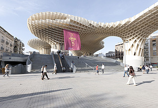 Metropol Parasol Sevilla Photo of the Metropol Parasol marketplace in Seville Spain. You can see very large and high mushroom-like wooden constructions.