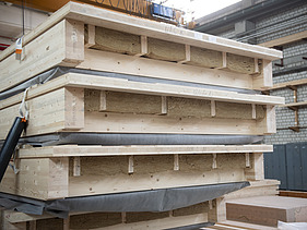 Photo of wooden box elements in the ZÜBLIN Timber production hall.