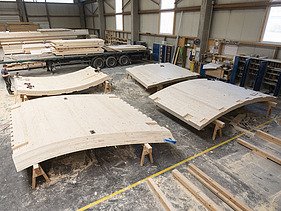 Photo of LENO cross-laminated timber elements in the ZÜBLIN Timber production hall.