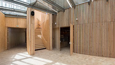 Photo of the Elizabethan Theater in Condette France. You can see an interior made of wood.