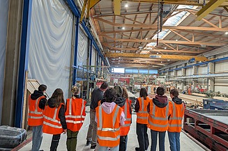 The girls on a production tour of the plant.