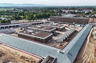 The complex consists of a main building with office space and workshops.  