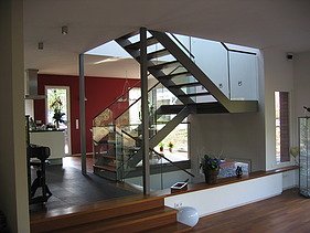 Photo of a wooden house with clinker facade. LENO-BSP. Detailed picture of living room.