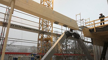 Photo of a BSH beam during assembly. Project: Calw District Office.